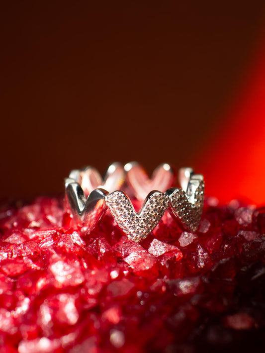 Anillo corazones enlazados